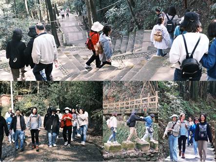 一群人站在石头上描述已自动生成